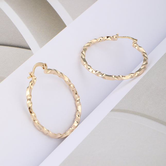 Aretes De Cobre Dorado Diseño De Aro Con Trenzado Elegante