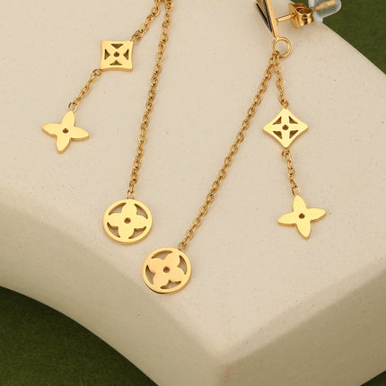 Aretes Largos En Acero De Trébol Hueco Con Flecos, Diseño Dorado