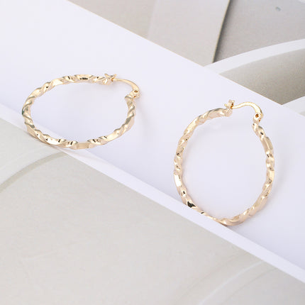 Aretes De Cobre Dorado Diseño De Aro Con Trenzado Elegante