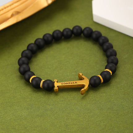 Pulsera De Cuentas Negras Mate Con Ancla Estilo Náutico