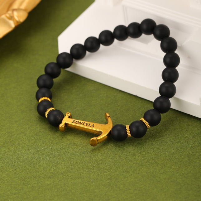 Pulsera De Cuentas Negras Mate Con Ancla Estilo Náutico