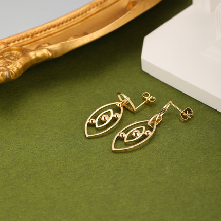 Aretes De Cobre Clásicos Con Colgante Ojo De Demonio En Oro 18K