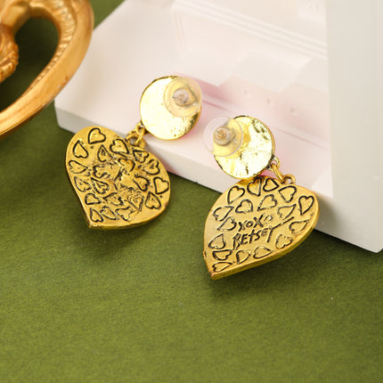 Aretes Con Diseño De Corazón Con Cristal Morado Sintético Y Bisel Metálico