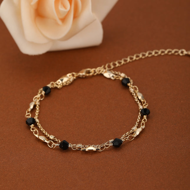 Pulsera De Doble Cadena Con Cristal Negro Y Detalles En Cobre