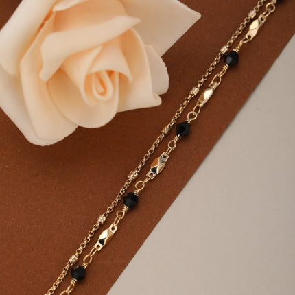 Pulsera De Doble Cadena Con Cristal Negro Y Detalles En Cobre