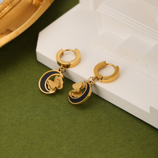 Aretes De Acero Con Colgante De Luna Negra Y Mariposa Flotante