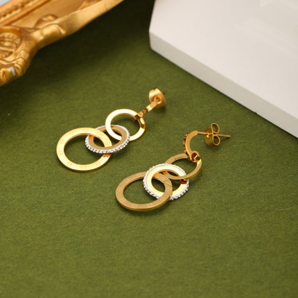 Aretes Arracadas De Aros Conectados Y Flecos, Diseño Moderno En Acero