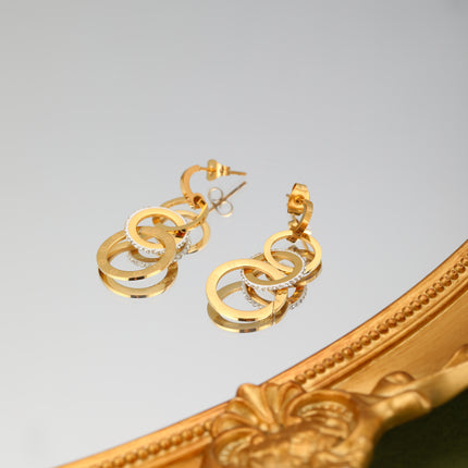 Aretes Arracadas De Aros Conectados Y Flecos, Diseño Moderno En Acero