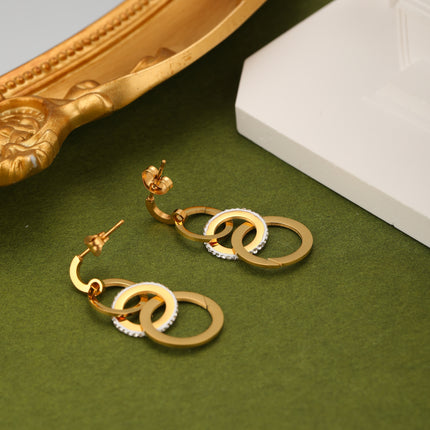 Aretes Arracadas De Aros Conectados Y Flecos, Diseño Moderno En Acero