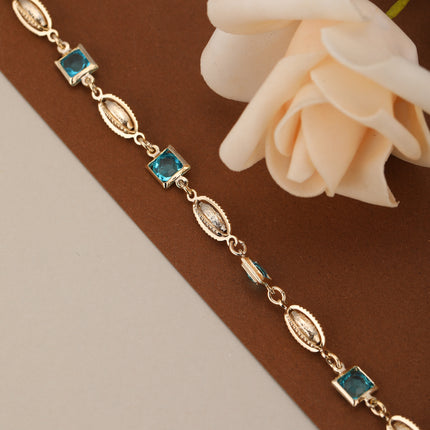 Pulsera De Cobre Con Cubos, Cristales Azules Y  Concha Metálica