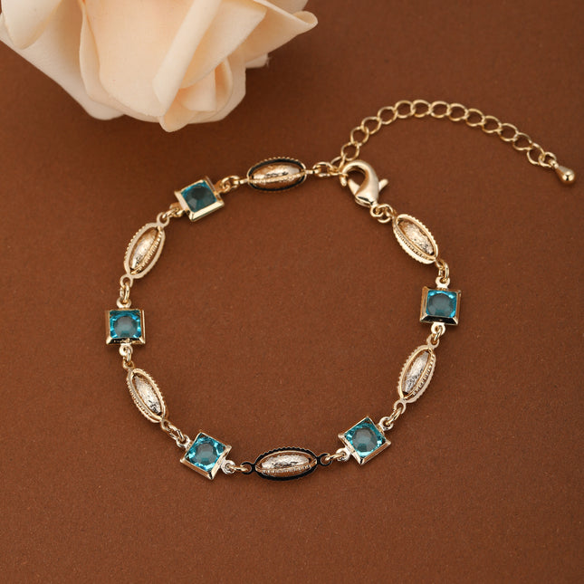 Pulsera De Cobre Con Cubos, Cristales Azules Y  Concha Metálica