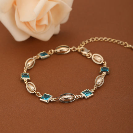 Pulsera De Cobre Con Cubos, Cristales Azules Y  Concha Metálica