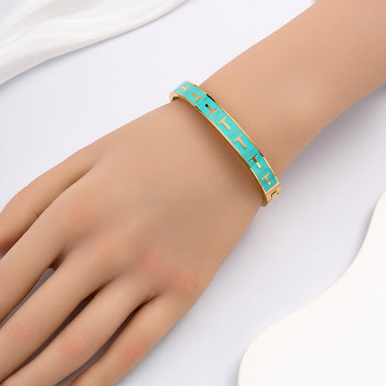 Pulsera Brazalete Con T Dorada En Rectángulo Azul Y Cierre De Clip