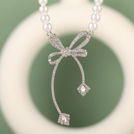 Collar Elegante De Perlas Con Colgante De Cobre De Lazo De Lujo Leve De Moda