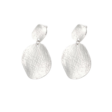 Aretes En Cobre De Círculos Plateados Diseño Moderno Y Minimalista