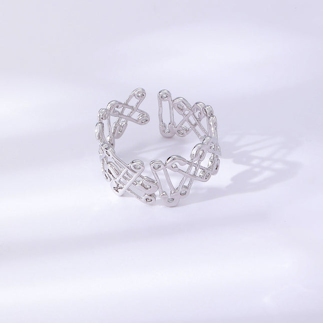 Anillo Con Diseño Clip Hueco Y Diamantes De Zirconia De Cobre Chapado En Plata