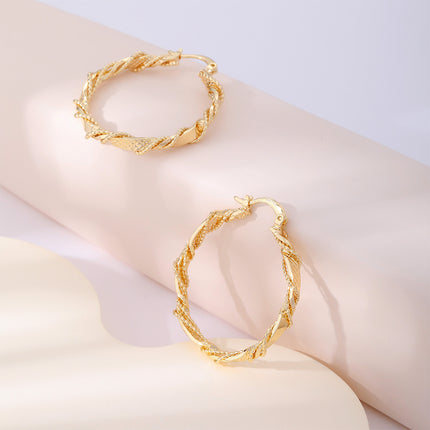 Aretes Arracadas En Cobre Con Diseño De Trenzado Metálico