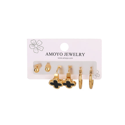 Aretes Chapado En Oro Con Aros Y Flor De Cuatro Hojas Diseño Elegante