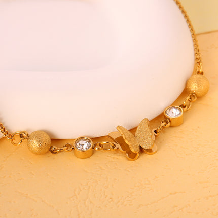 Tobillera Cadena Giratoria De Acero Inoxidable Con Mariposa De Arena Rensada Y Bolas De Acero