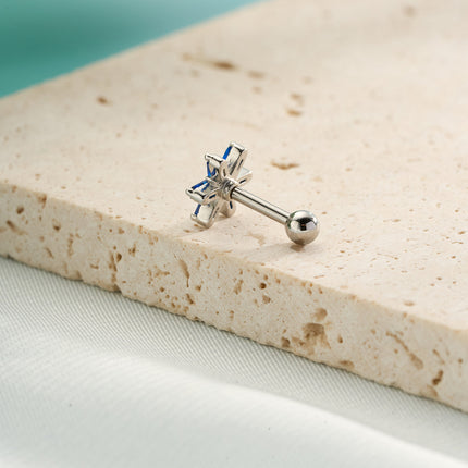 Piercing Clavo De Hueso Del Oído Plateado Con Pequeña Flor Azul Elegante