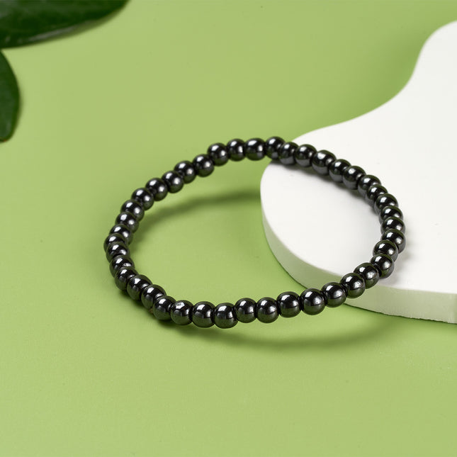 Pulsera Minimalista De Cuentas Negras Con Superficie Lisa Estilo Sobrio