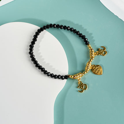 Pulsera De Cuentas Negras Con Tres Colgantes Dorados Estilo Moda