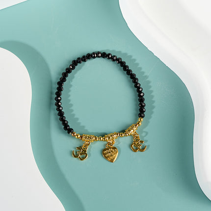 Pulsera De Cuentas Negras Con Tres Colgantes Dorados Estilo Moda