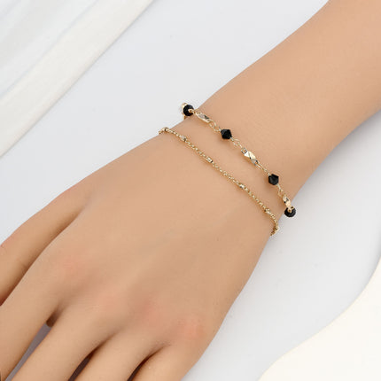 Pulsera De Doble Cadena Con Cristal Negro Y Detalles En Cobre