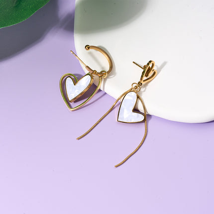 Aretes Largos De Corazón Asimétrico Con Diseño Único En Acero De Titanio