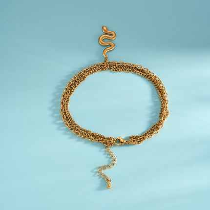 Tobillera Cadena Clásica En Ins De Acero Al Titanio De 18K Con Elemento De Serpiente Multicapa