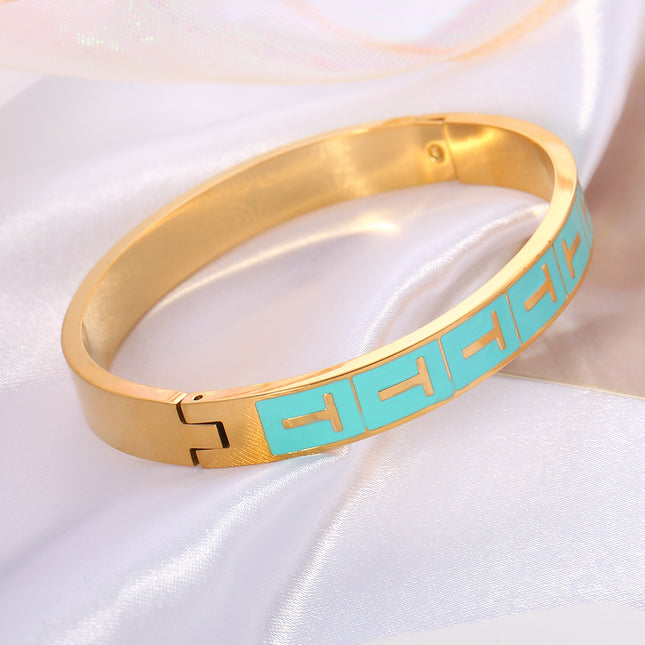 Pulsera Brazalete Con T Dorada En Rectángulo Azul Y Cierre De Clip