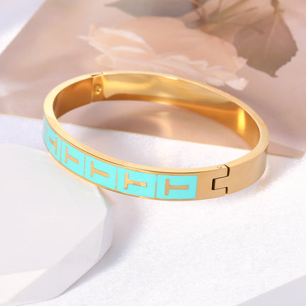 Pulsera Brazalete Con T Dorada En Rectángulo Azul Y Cierre De Clip