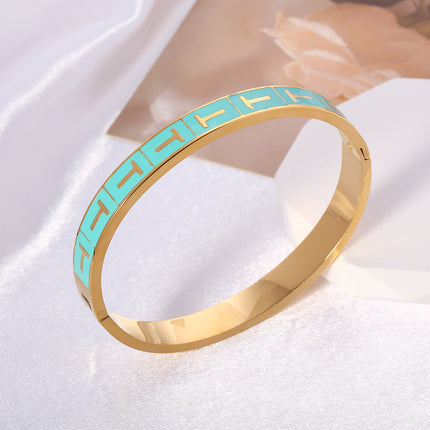 Pulsera Brazalete Con T Dorada En Rectángulo Azul Y Cierre De Clip