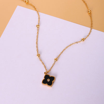 Collar De Trébol De Cuatro Negro Diseño Elegante Y Minimalista