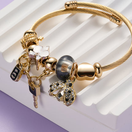 Pulsera De Acero Inoxidable Dorado Con Colgantes De Llave Negra