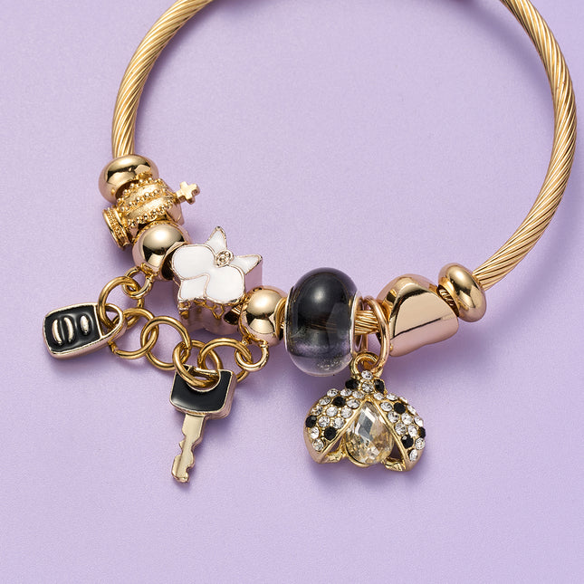 Pulsera De Acero Inoxidable Dorado Con Colgantes De Llave Negra
