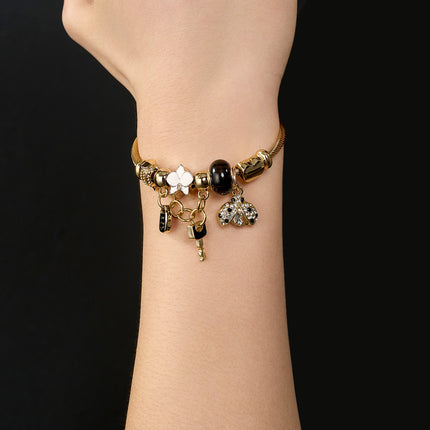 Pulsera De Acero Inoxidable Dorado Con Colgantes De Llave Negra