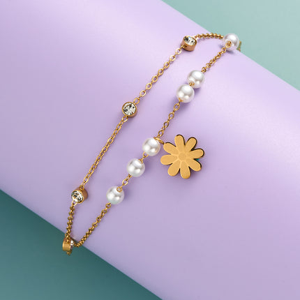 Pulsera De Acero Inoxidable Con Perlas Y Detalles De Flor De Margarita