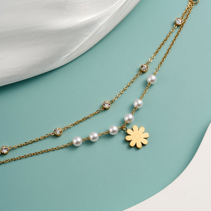 Pulsera De Acero Inoxidable Con Perlas Y Detalles De Flor De Margarita