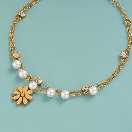 Pulsera De Acero Inoxidable Con Perlas Y Detalles De Flor De Margarita