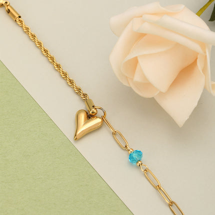 Pulsera De Acero Con Colgante De Corazón Y Zirconia Azul En Oro De 14K