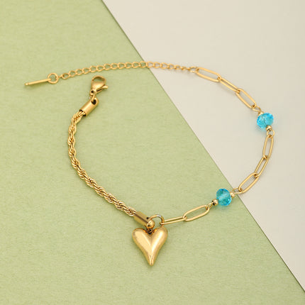 Pulsera De Acero Con Colgante De Corazón Y Zirconia Azul En Oro De 14K