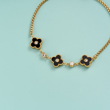 Pulsera De Cadena Con Flor Negra Detalle De Circon En El Centro