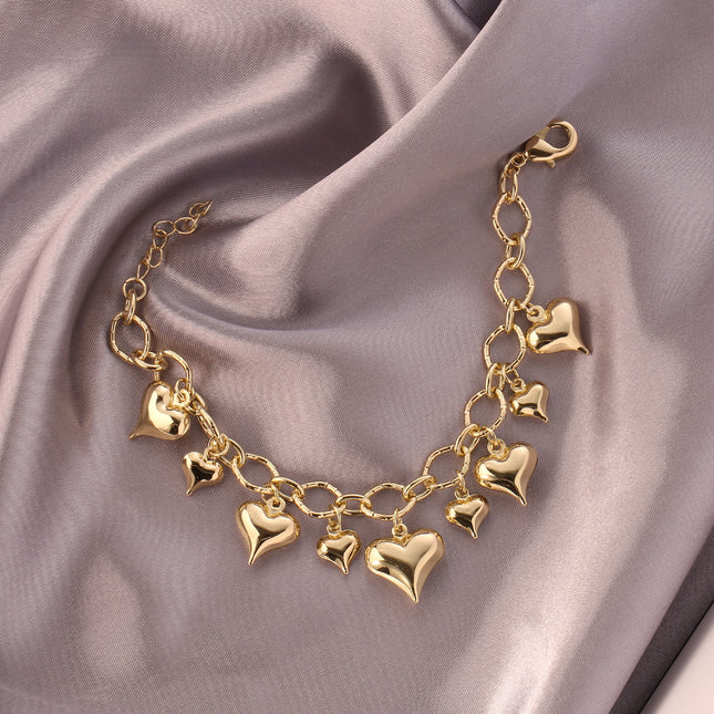 Pulsera De Moda En Cobre De Oro 14K Con Múltiples Colgantes De Corazón