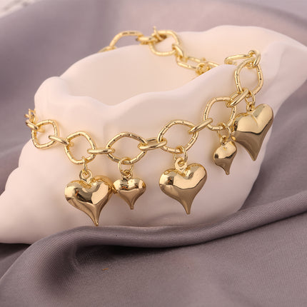 Pulsera De Moda En Cobre De Oro 14K Con Múltiples Colgantes De Corazón