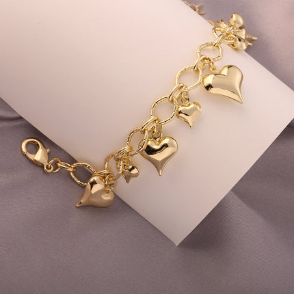 Pulsera De Moda En Cobre De Oro 14K Con Múltiples Colgantes De Corazón
