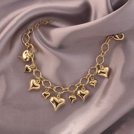 Pulsera De Moda En Cobre De Oro 14K Con Múltiples Colgantes De Corazón
