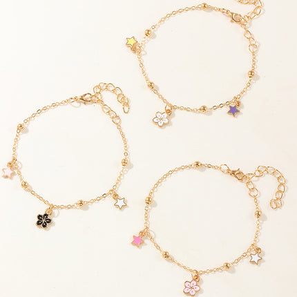Pulsera Femenina De Metal Con Dijes De Flor O Planeta Y Flecos Modernos