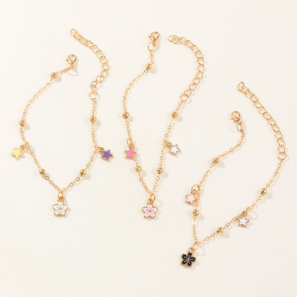 Pulsera Femenina De Metal Con Dijes De Flor O Planeta Y Flecos Modernos