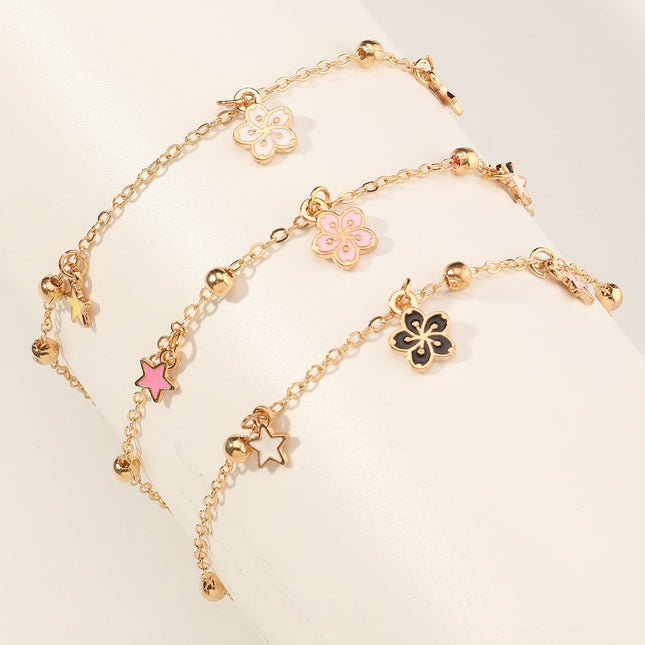 Pulsera Femenina De Metal Con Dijes De Flor O Planeta Y Flecos Modernos